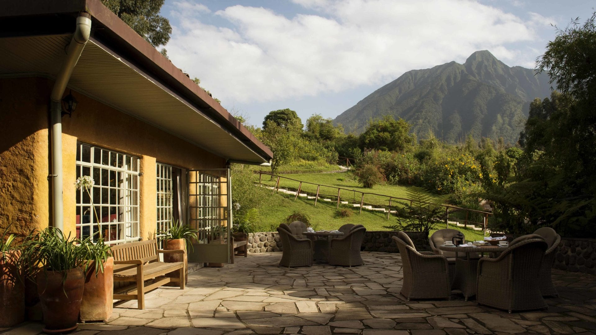 shalom safaris accomodation sabyinyo rwanda cottage exterior